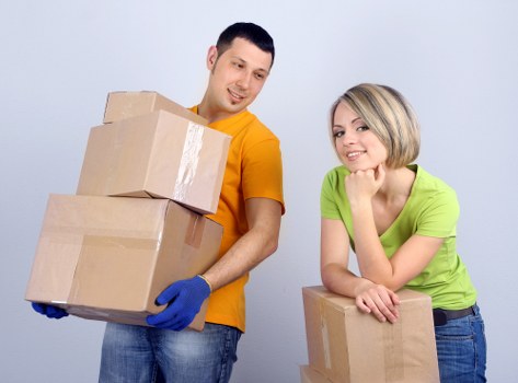 Furniture and boxes being loaded into a moving van in Balham