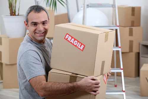 Office relocation planning in Balham with desks and moving boxes