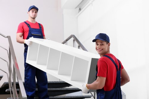 Moving team reviewing safety procedures before work
