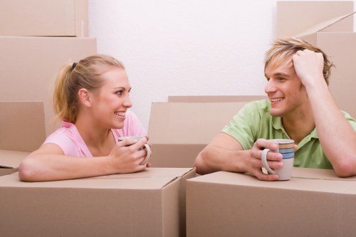 Packed business equipment and office furniture ready for transport