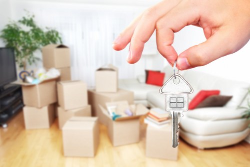 Balham residential flat move with boxes and furniture being carried