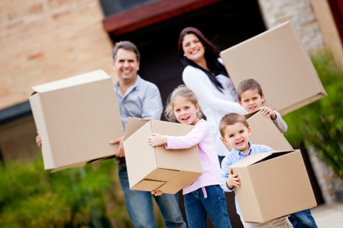Professional removal crew loading furniture carefully